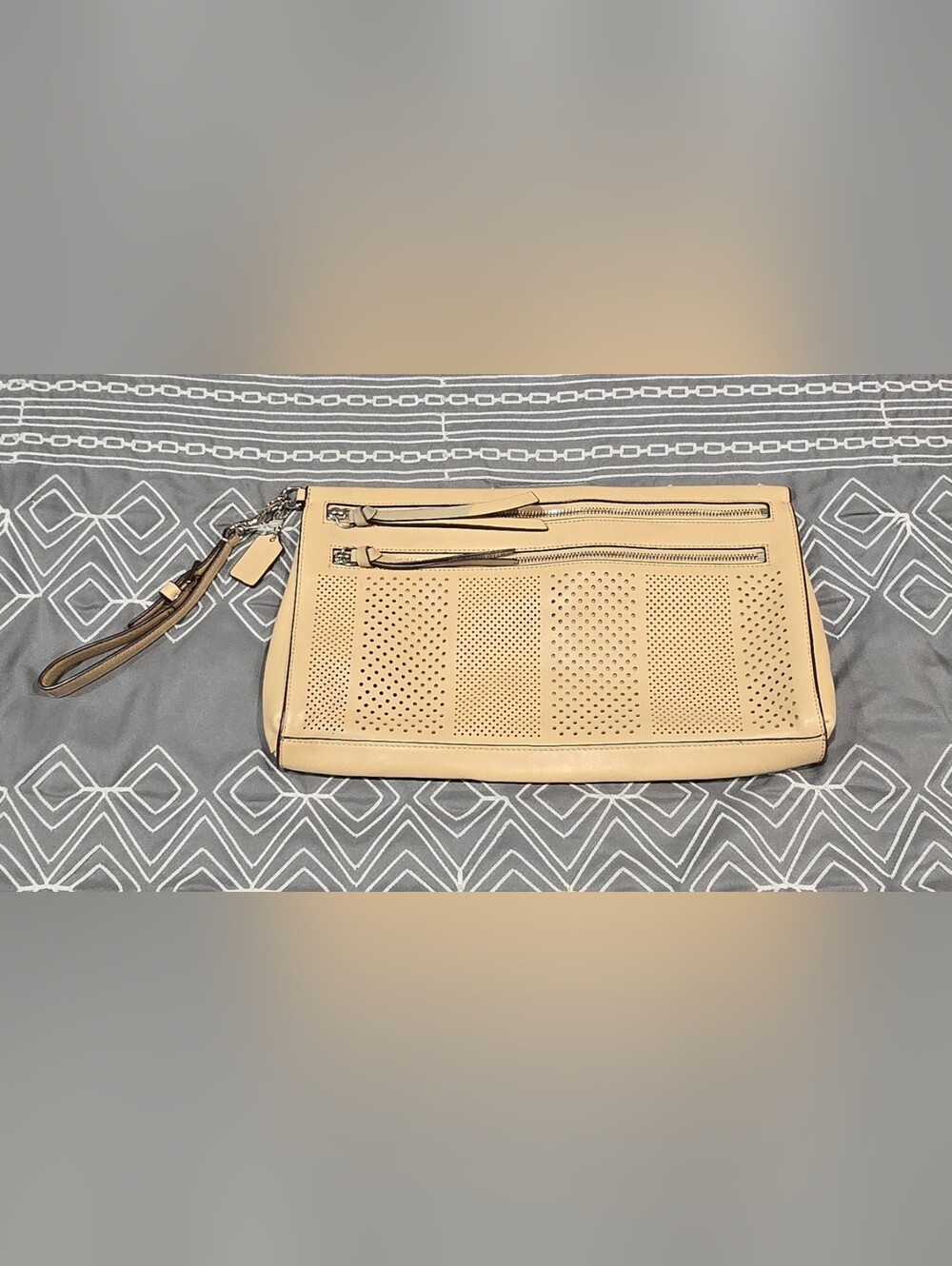 Coach Bleecker Perforated Leather Clutch In Cream